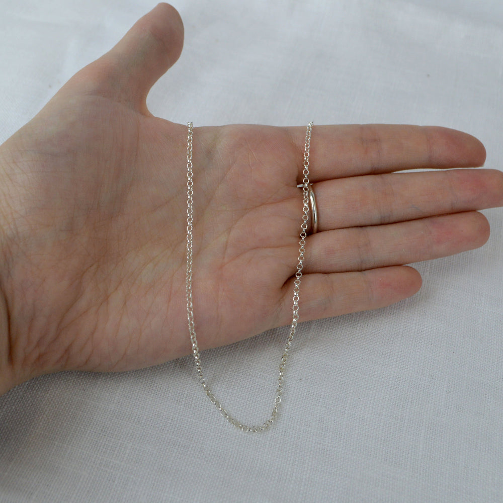 Necklace chain on a hand